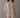 Rueth Poncho soft ivory poncho top with fluid drape and asymmetrical hem, featuring a loose silhouette for a relaxed, effortless look.