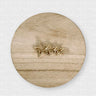 Gold star-shaped hair clip with crystal accents on wood background – Sabina Hair Clip by Matte.