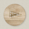 Sabo Hair Clip with gold triangle shape and pearl accents on wood background, elegant accessory photo for Matte.
