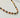 Sabrina Necklace by Matte, multicolor beaded gold plated necklace on white surface
