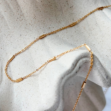 Sequence gold filled chain necklace by Matte, close-up of bar and link design