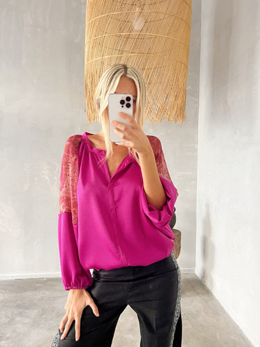 Model wearing Shibori Blouse in fuchsia silk with lace sleeves, tucked — Matte Concept Store
