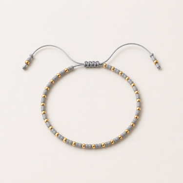 Solei Bracelet minimalist beaded bracelet with gold accents and adjustable fit.