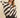 Stripe City Blouse by Matte – ivory and black diagonal striped blouse styled with leather shorts