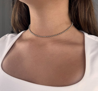 Model wearing Sunbeam Necklace by Matte, silver beaded chain, 14 inch choker