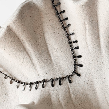 Taina enammel gold plated necklace by Matte, geometric choker on neutral background