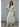 Talina lightweight ivory knit cardigan featuring a relaxed silhouette, elbow-length sleeves, a button-front closure, and rolled-edge trim.