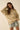 Relaxed fit tiger embroidered sweater in beige knit, side view.
