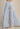 Full-length front view of blue and white striped palazzo pants with a relaxed high-waisted fit and wide-leg silhouette.