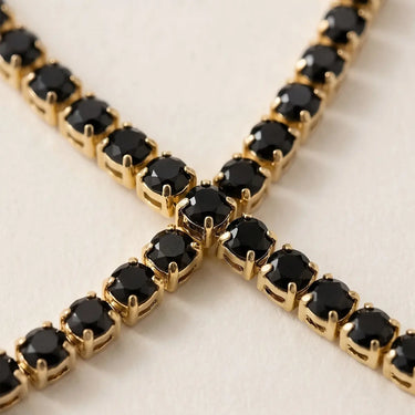Close-up detail of the black simulated diamond settings.