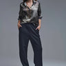 Silky abstract-print button-down shirt in layered grey tones, shown on model with relaxed fit and long sleeves — Verena Shirt by Matte.
