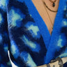 Close-up of Wave Cardigan in vibrant blue mohair knit with abstract pattern and soft texture