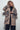 Front view of Wild Muse Leopard Cardigan with bold leopard motif in neutral knit.