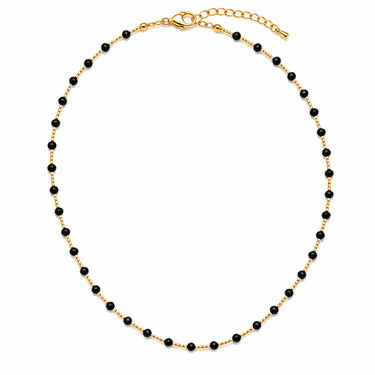Zaro Necklace black beaded necklace with gold-tone accents and adjustable chain on white background.