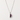 Zaromi Necklace featuring a silver-tone chain with a reversible half-moon pendant showcasing sparkling cubic zirconia on one side and vibrant pavé stones on the other, styled on a light neutral background for everyday layering.
